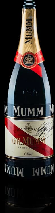 Michael Schumacher signed Mumm podium bottle